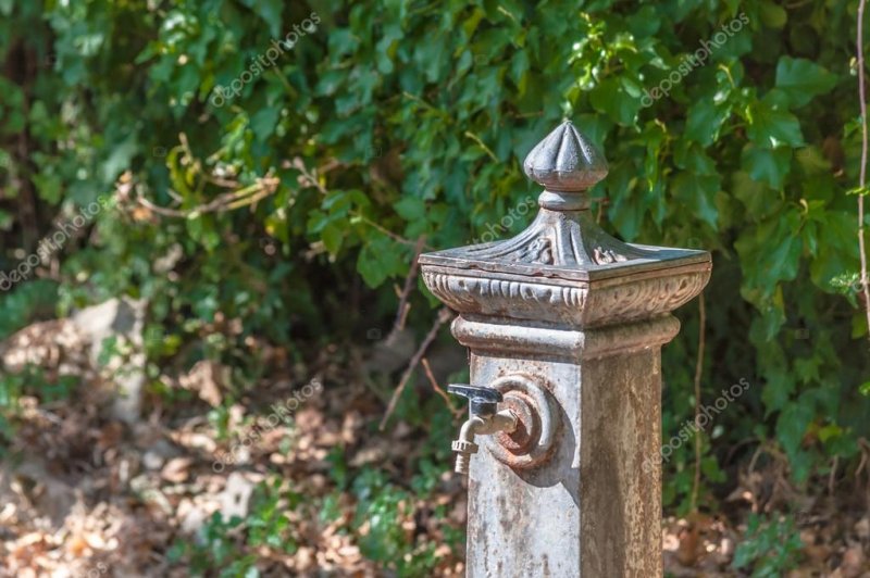 depositphotos_115630960-stock-photo-closeup-of-old-fountain.jpg